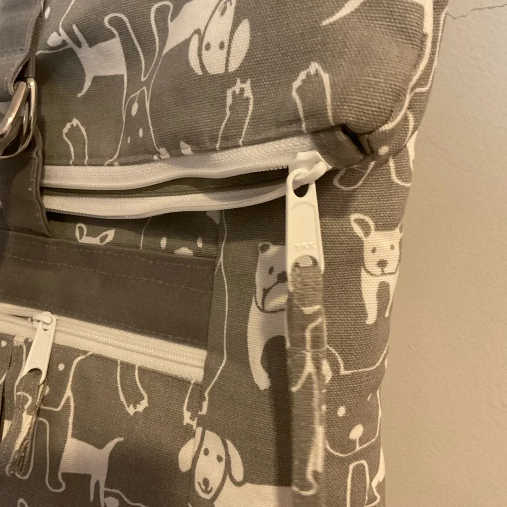 Gray and White Backpack with Dogs